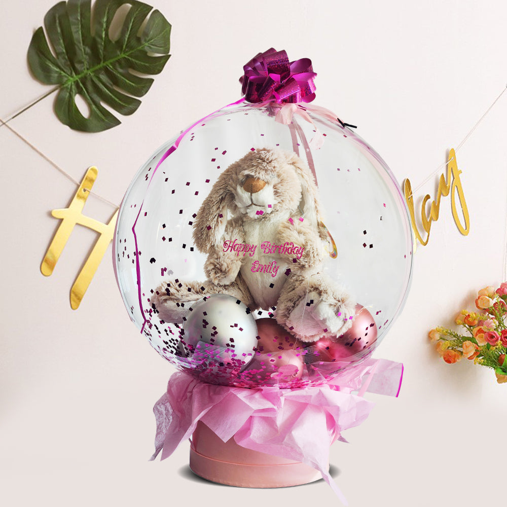 Delight her imagination with our 'Girls' Magical Birthday Balloon,' a dreamy mix of pink and silver confetti and a charming stuffed rabbit. Designed to be the centerpiece of her party, it's perfect for adding a sprinkle of magic to any birthday celebration.